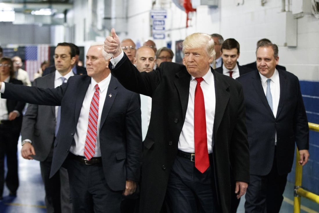 Then-President-elect Donald Trump and then-Vice-President-elect Mike Pence visit a Carrier factory in Indianapolis in December 2016. Trump has taken a tough position on trade, claiming that the policies of his predecessors have failed the American working class. Photo: AP