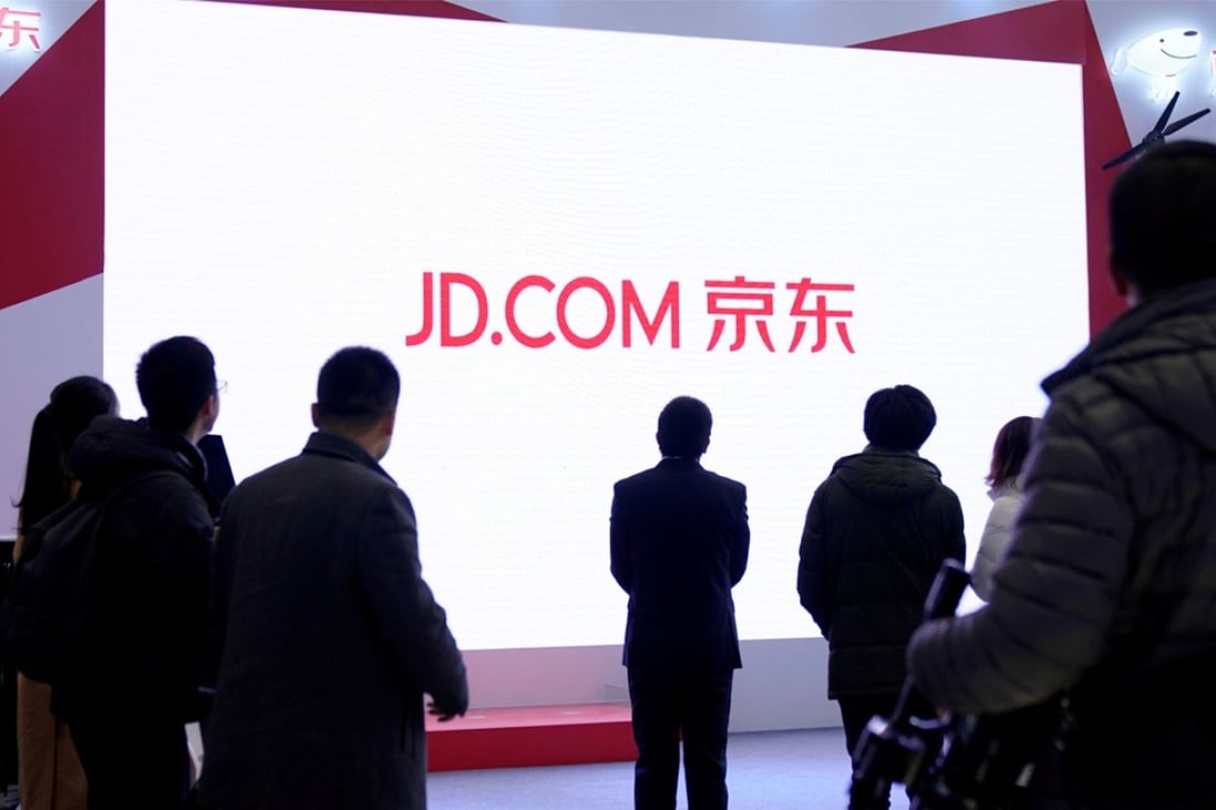 FILE PHOTO: A JD.com sign is seen during the fourth World Internet Conference in Wuzhen, Zhejiang province, China, December 4, 2017. REUTERS/Aly Song/File Photo
