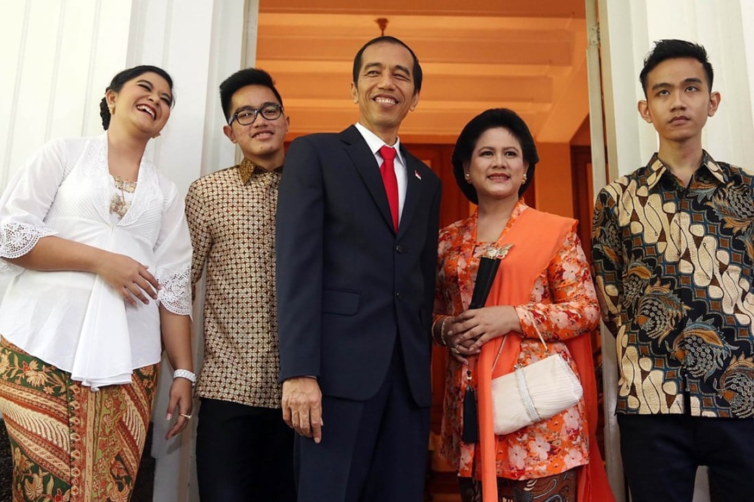 Indonesia's President Joko Widodo and family. With key electoral tests looming, Widodo has little incentive to meddle with what is proving to be a popular healthcare scheme. Photo: AFP
