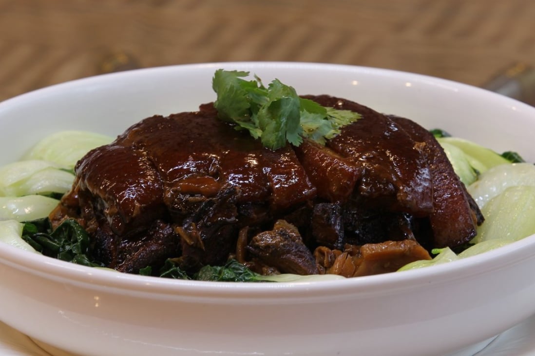 A dish of Hakka-style braised sliced pork belly with pickled mustard greens at Red Kitchen. Photo: Roy Issa