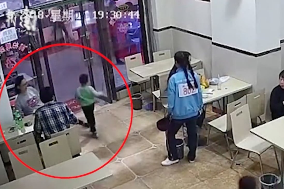Surveillance footage captures the woman tripping the child. Photo: Thepaper.cn