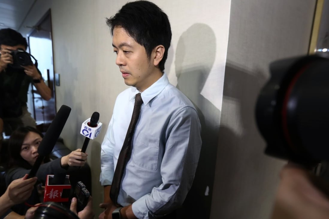 Lawmaker Ted Hui Chi-fung apologising for grabbing a government official’s phone without her consent. Photo: Nora Tam
