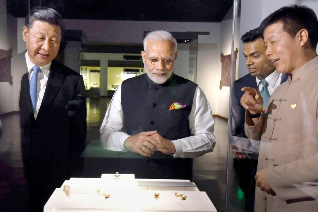 Xi Jinping and Narendra Modi visited an exhibition at Hubei provincial museum before their first discussion of the day. Photo: Reuters/ Press Information Bureau