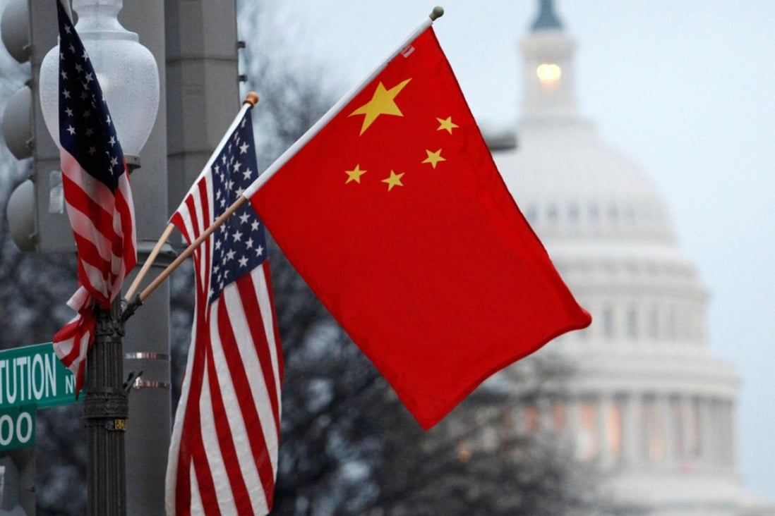 The Chinese and American flags fly on a lamp post along Pennsylvania Avenue near the US Capitol during then president Hu Jintao's state visit in 2011. The world is disoriented because the old order is changing, and all we know is that what is replacing it is going to be very different. Photo: Reuters 