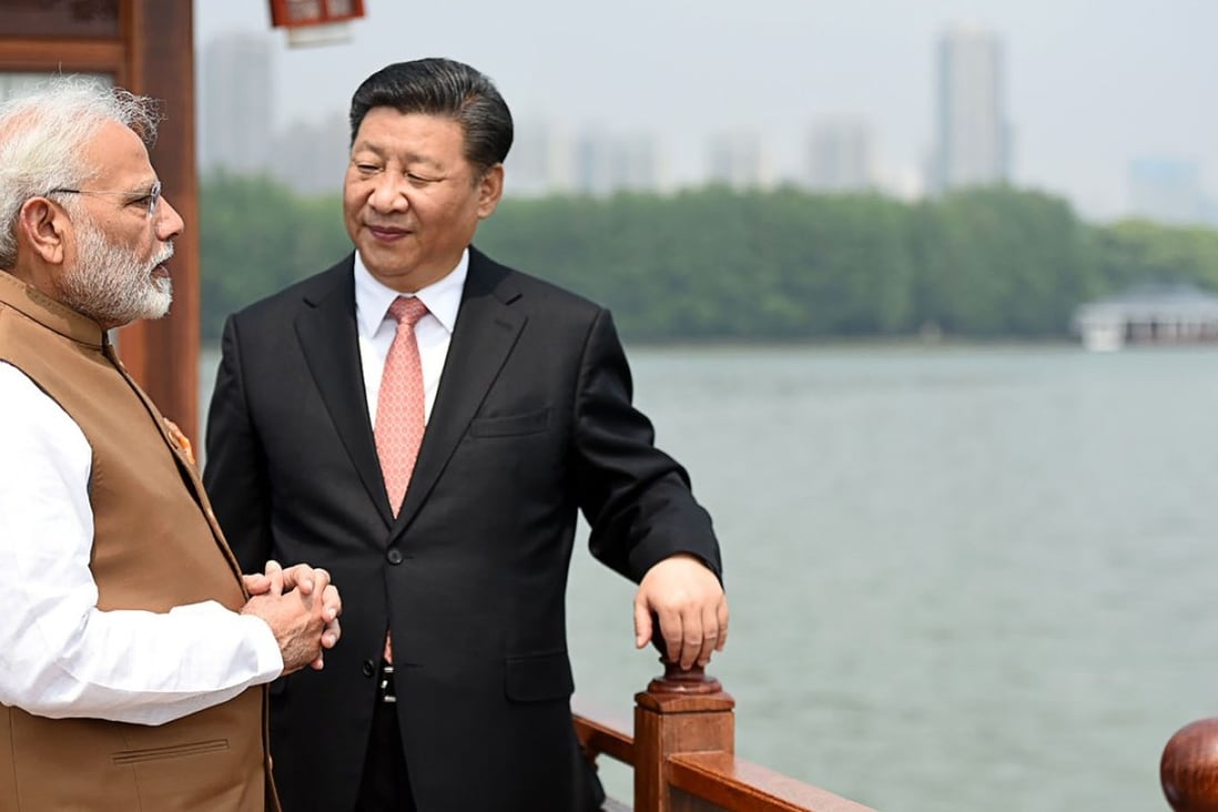 Indian Prime Minister Narendra Modi and Chinese President Xi Jinping at East Lake, in Wuhan. Photo: AFP