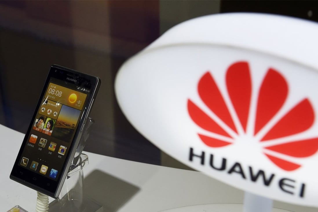 A mobile phone made by Chinese telecom equipment maker Huawei displayed in a store in Beijing. 