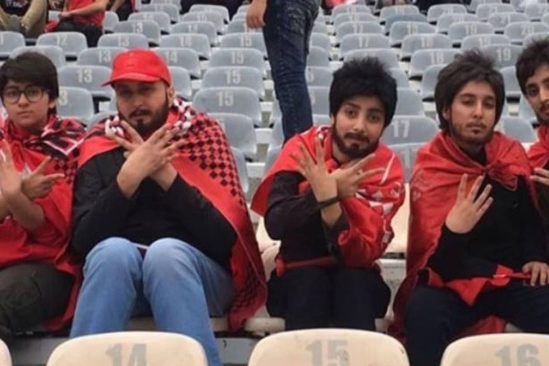 Iranian women wear fake beards to defy stadium ban and attend football ...