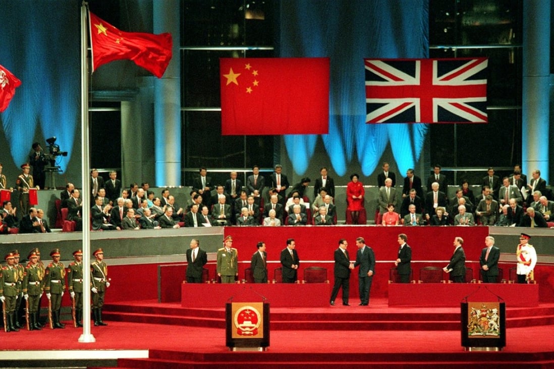Jiang Zemin shakes hands with Charles, Prince of Wales at the handover ceremony for Hong Kong at midnight on June 30, 1997. Photo: Handout