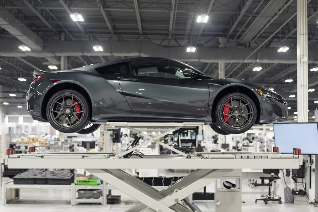 A Honda Motor Company 2017 Acura NSX sits on a lift at the Honda Performance Manufacturing Centre in Marysville, Ohio, in November 2016. Japan multinationals contribute the most foreign investment in Ohio, a rust belt swing state that responded favourably to Donald Trump’s protectionist rhetoric in the 2016 election. Photo: Bloomberg