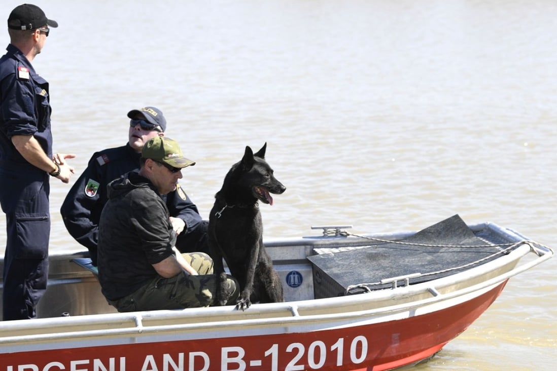 Austrian police scour Austria’s Lake Neusiedl (Neusiedler See) on April 20 after a torso was found in the water on April 13. Further body parts were found on April 16. A suspect in the case, ‘Alfred U’, was arrested, police said on Wednesday. Photo: APA via AFP
