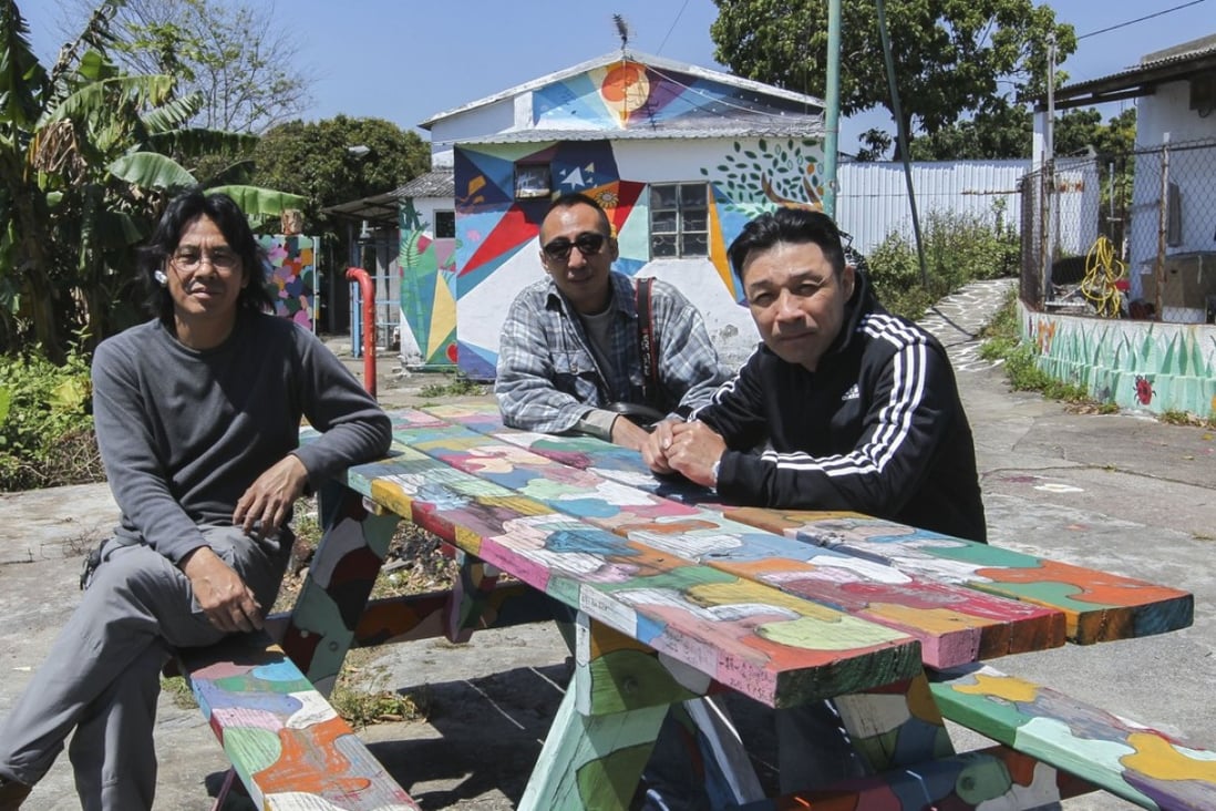 (From left) Villagers Yuen Ka-keung, who started the mural campaign, John Choy Yuk-wai and Yeung Koon-ping. Photo: Roy Issa