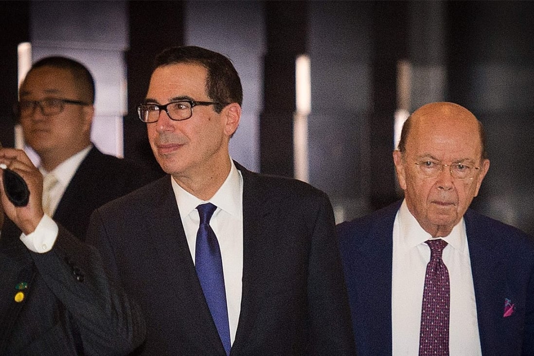 US Treasury Secretary Steven Mnuchin (left) and US Commerce Secretary Wilbur Ross on Friday, headed to a second day of trade talks with their Chinese counterparts. The talks ended with the two sides only agreeing to continue discussions on the issues. Photo: AFP