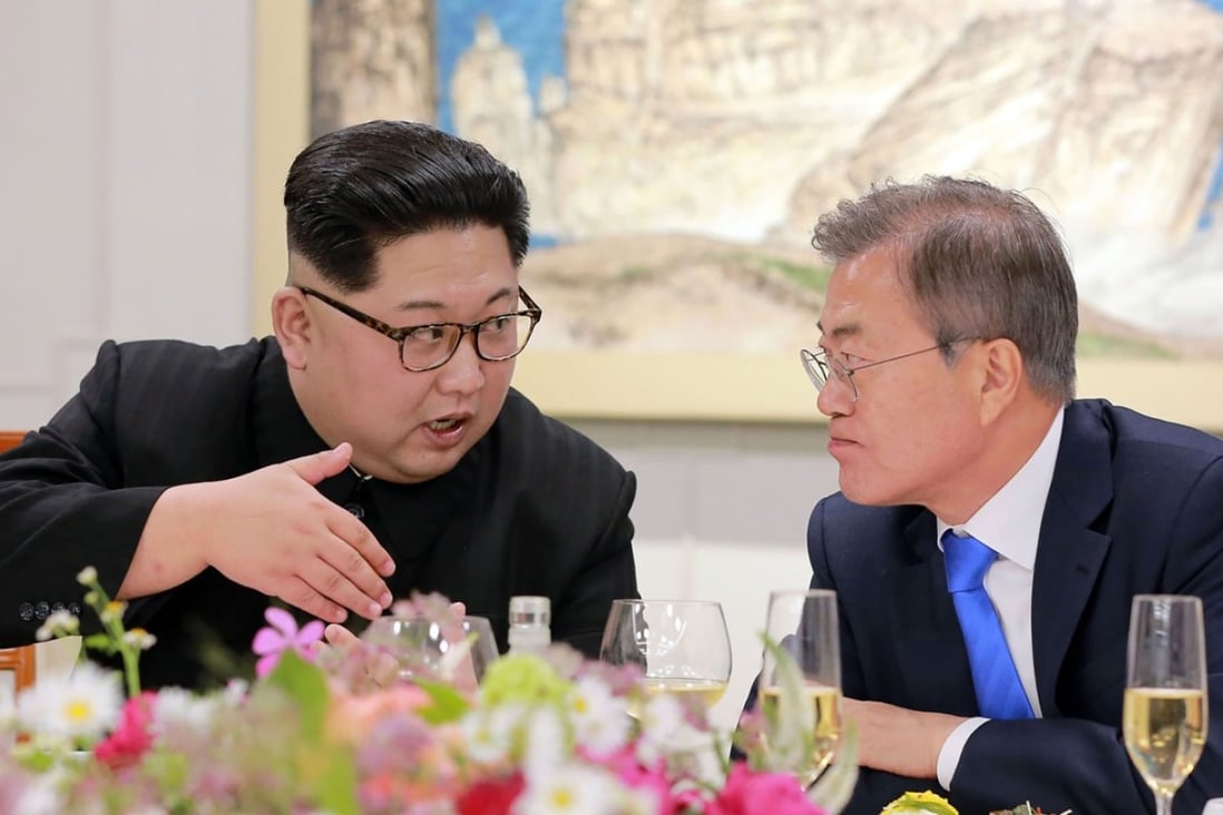 This picture taken on April 27, 2018 and released from North Korea's official Korean Central News Agency (KCNA) on April 29, 2018 shows North Korea's leader Kim Jong Un (L) and South Korea's President Moon Jae-in (R) speaking during the official dinner at the end of their historic summit at the truce village of Panmunjom. Photo:AFP/KCNA VIA KNS/STR/ - South Korea