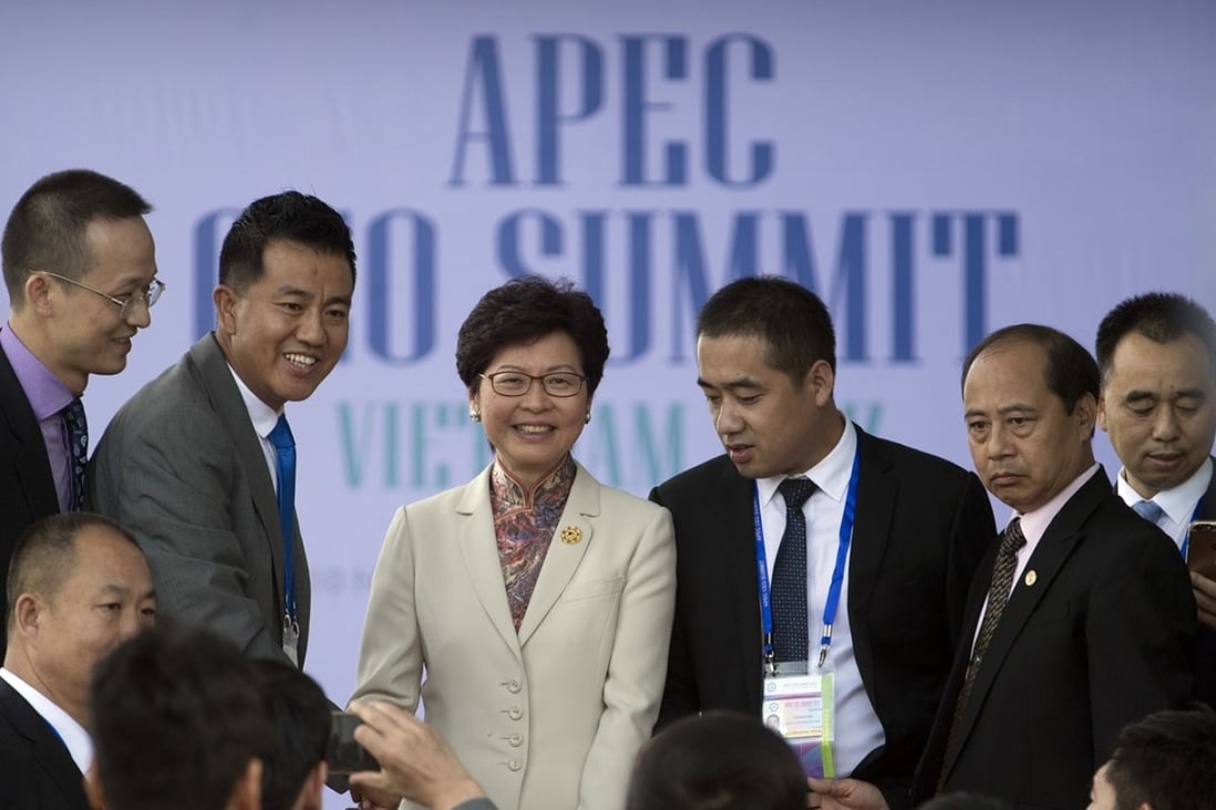 Hong Kong Chief Executive Carrie Lam Cheng Yuet-ngor, centre, leaves the Asia-Pacific Economic Cooperation CEO Summit in Danang, Vietnam, on November 9, 2017. Coordination between the governments of the Asia-Pacific region is essential for the formation of sustainable development policies. Photo: AP 