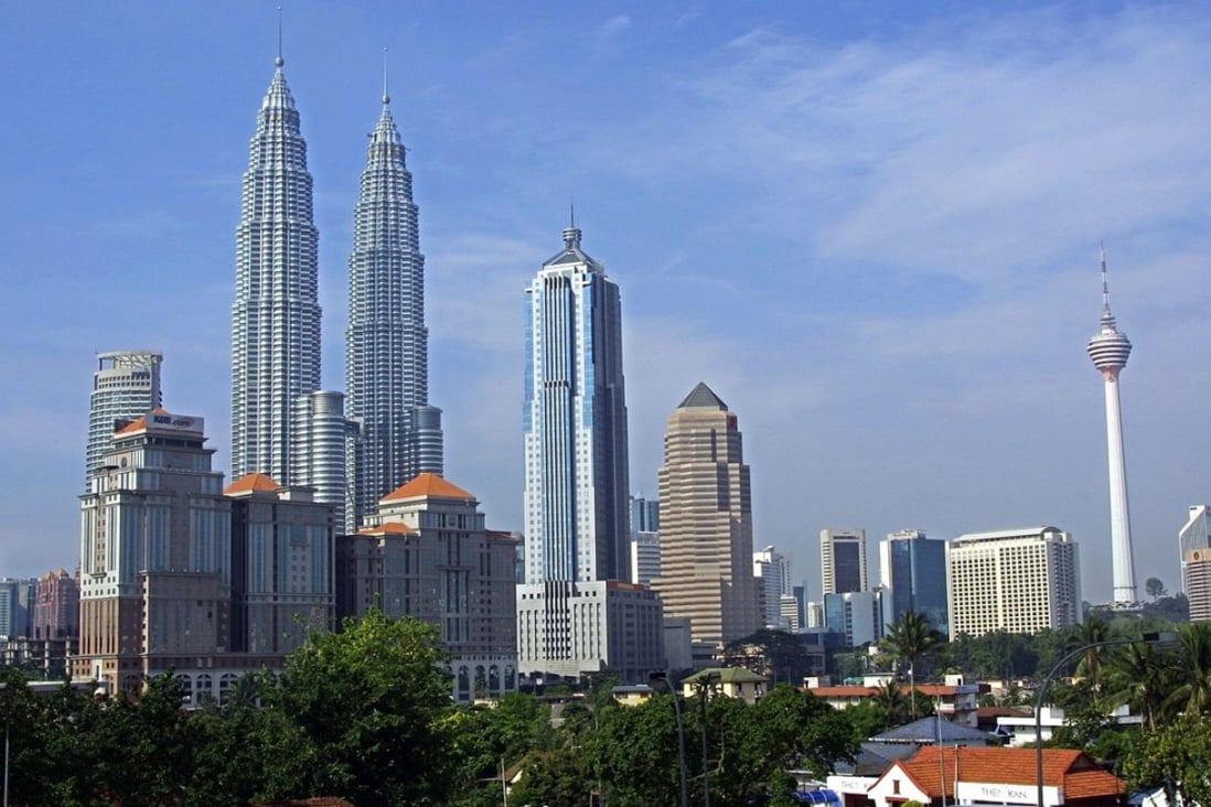 Chinese investors considering Malaysia should limit their property search to either Kuala Lumpur or Penang where end-user demand is more stable and less speculative, according to one analyst. Photo: AFP