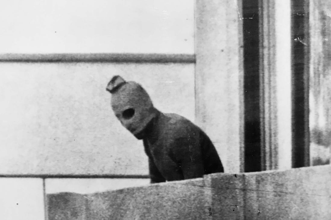 Russell McPhedran's iconic photo of a terrorist at the Munich Olympic Games in 1972. Photo: Russell McPhedran/Melbourne Press Club