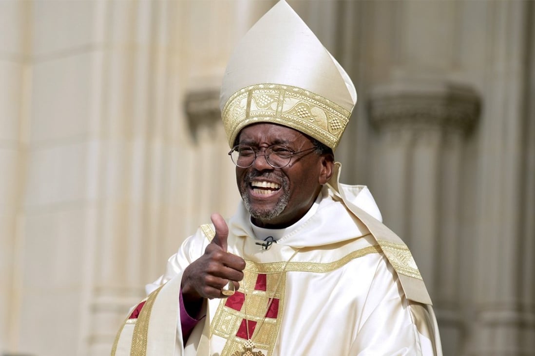 The Reverend Michael Bruce Curry gives a thumbs up as he arrives for his Installation ceremony at the Washington National Cathedral, in Washington, November 1, 2015. He will preach at the wedding of Prince Harry and Meghan Markle. Photo: Reuters