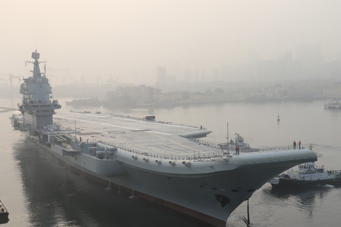 China’s new aircraft carrier leaves Dalian for its first sea trial on Sunday. Photo: Xinhua via AP