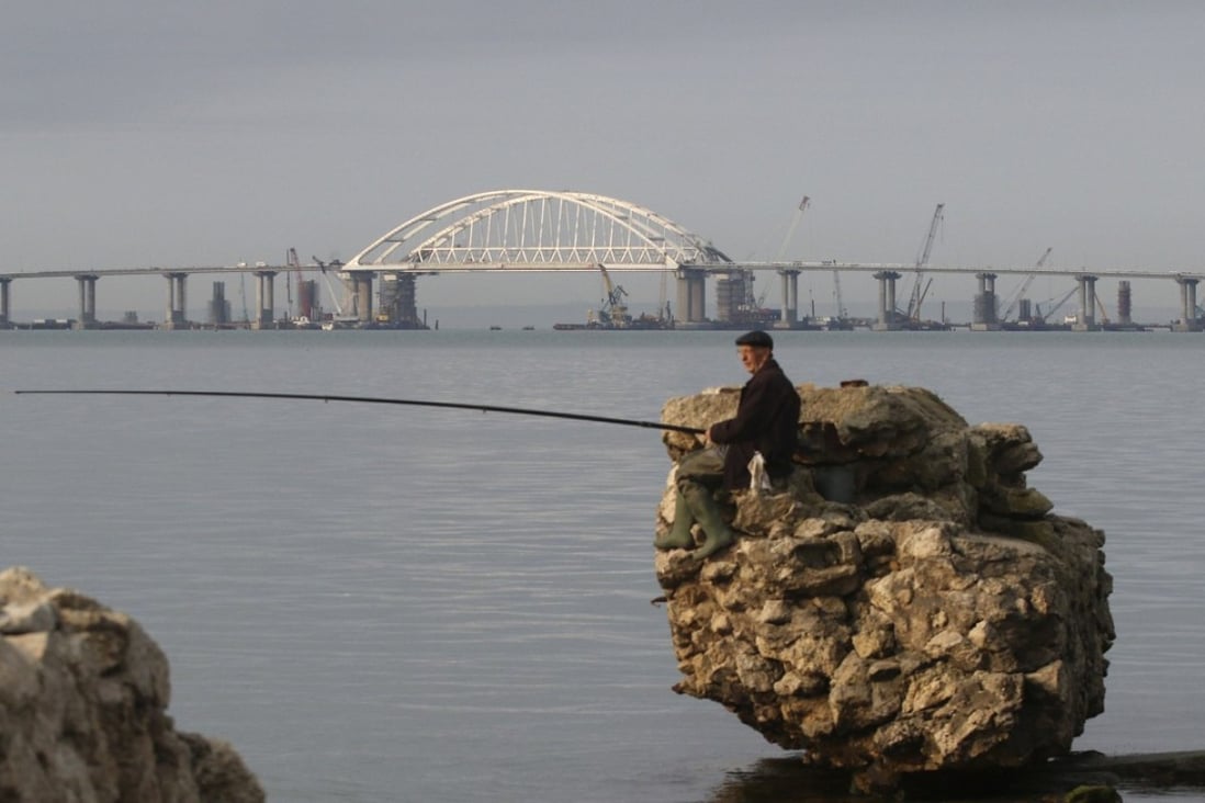 The road-and-rail bridge connecting Russia with the Crimean Peninsula, in the Kerch Strait, Crimea. Photo: Reuters