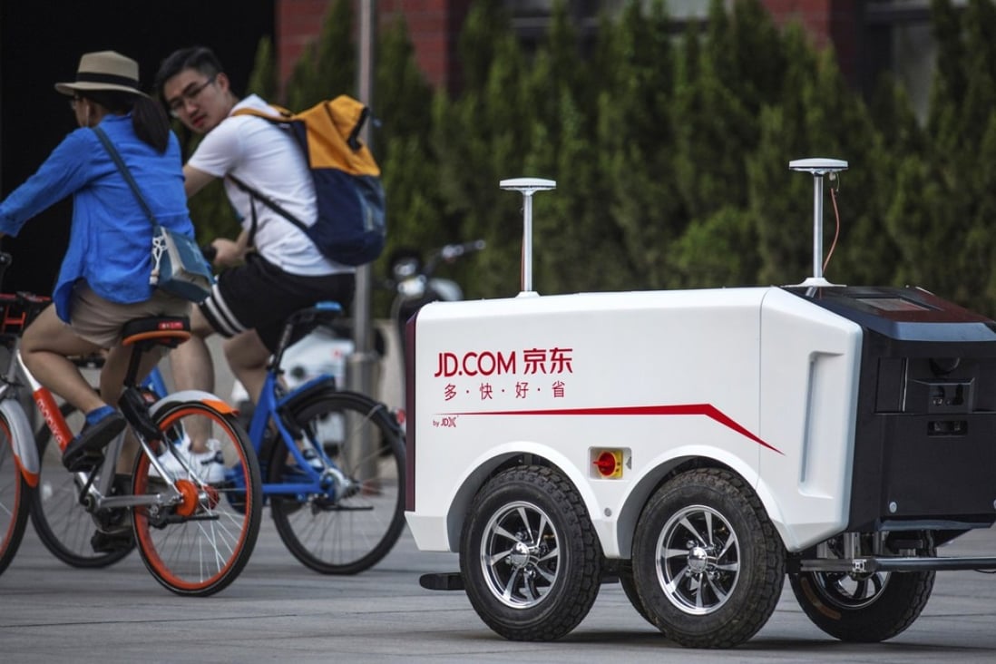 JD.com shows is working with major lift manufacturers to provide machine-to-machine communications between its courier robots and lifts to help complete deliveries inside buildings. Photo: AP