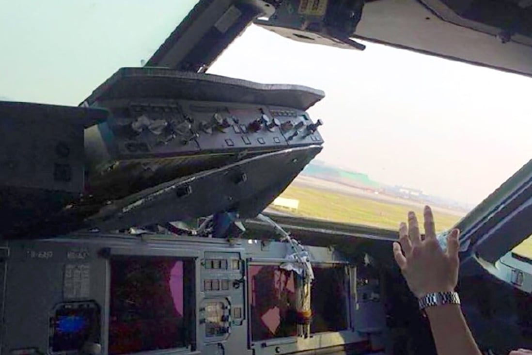 The right side of the cockpit window fell out during the flight. Photo: Weibo