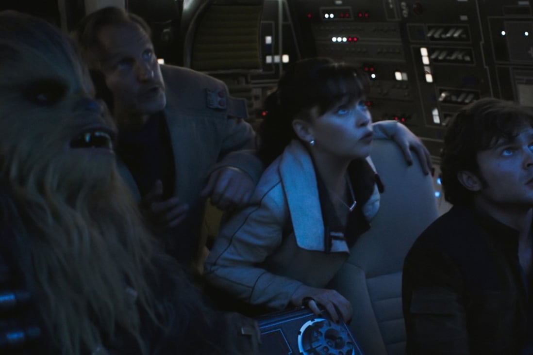 Joonas Suotamo (left), Woody Harrelson, Emilia Clarke and Alden Ehrenreich (right) star in Solo: A Star Wars Story (category IIA), directed by Ron Howard.