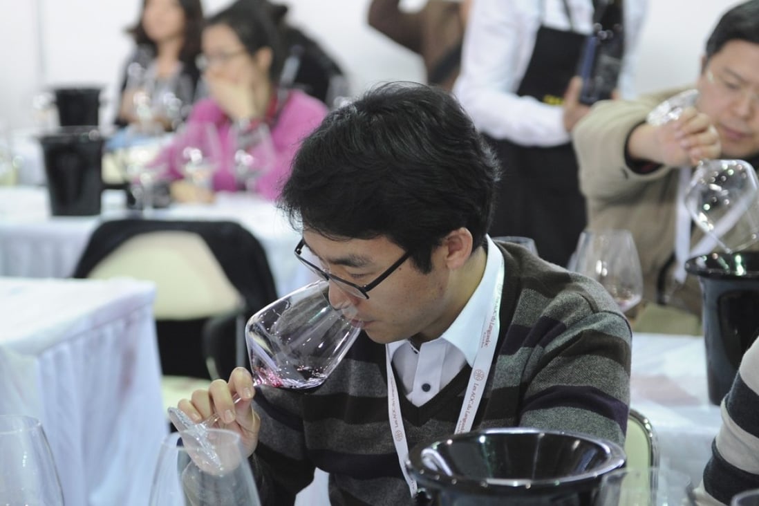 People attend a wine tasting course in Shanghai. Last year, the mainland imported 746 million litres of wine. Photo: AFP