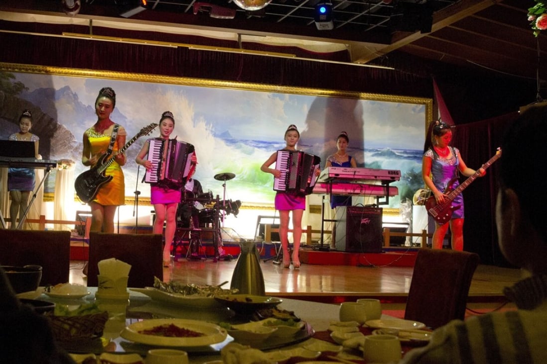 North Korean performers entertain customers at the Okryugwan restaurant in Beijing. Photo: AP
