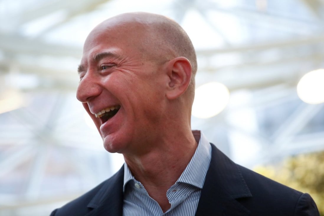 Amazon founder and CEO Jeff Bezos talks to the media while touring the new Amazon Spheres during the grand opening at Amazon's Seattle headquarters in Seattle, Washington, U.S. Photo: Reuters