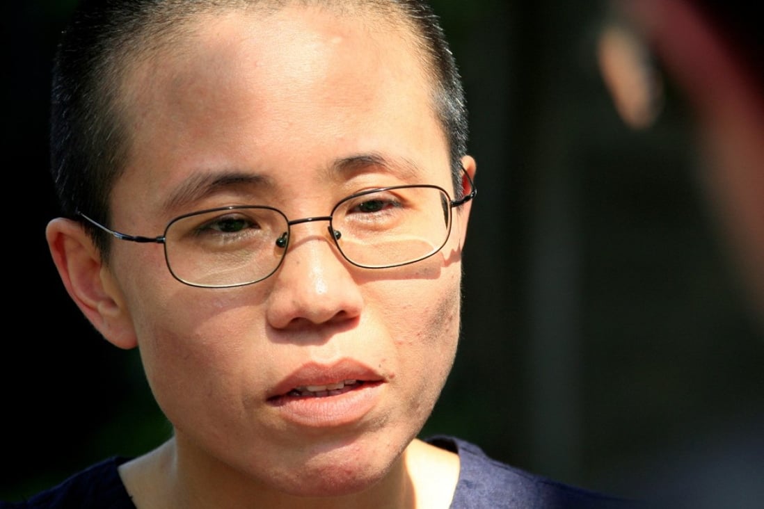 Sources said that Liu Xia, the widow of Nobel Peace Prize winner Liu Xiaobo, was visited by a senior official and close ally of President Xi Jinping and told she might be free within weeks. Photo: Reuters