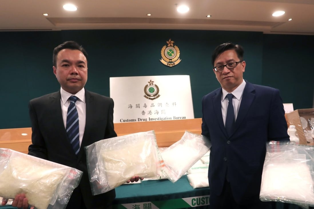 Hong Kong customs officials with a haul of crystal meth, also known as Ice. Photo: Jonathan Wong
