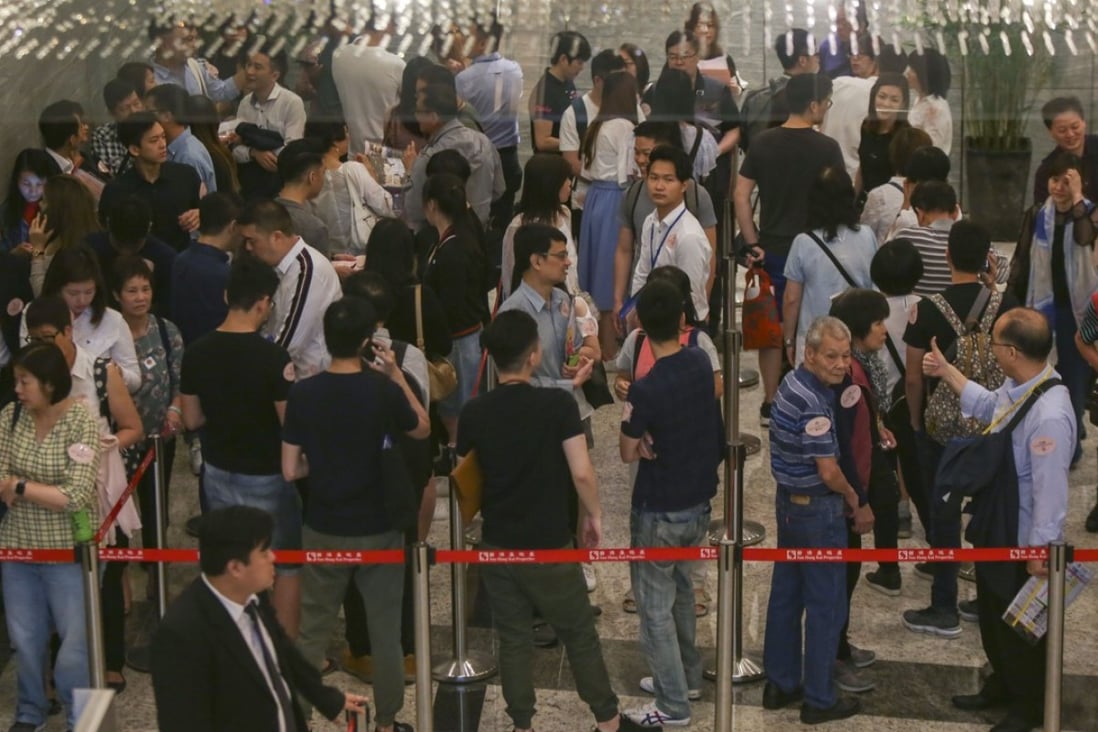 Potential buyers queue up as Sun Hung Kai Properties launch Mount Regency for sale at the International Commerce Centre (ICC) in West Kowloon on 12 May, 2018. Photo: SCMP / Xiaomei Chen