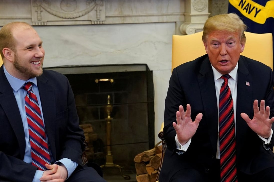 US President Donald Trump talks to the media with Josh Holt, an American missionary who was released by Venezuela, in the Oval Office of the White House. Photo: Reuters