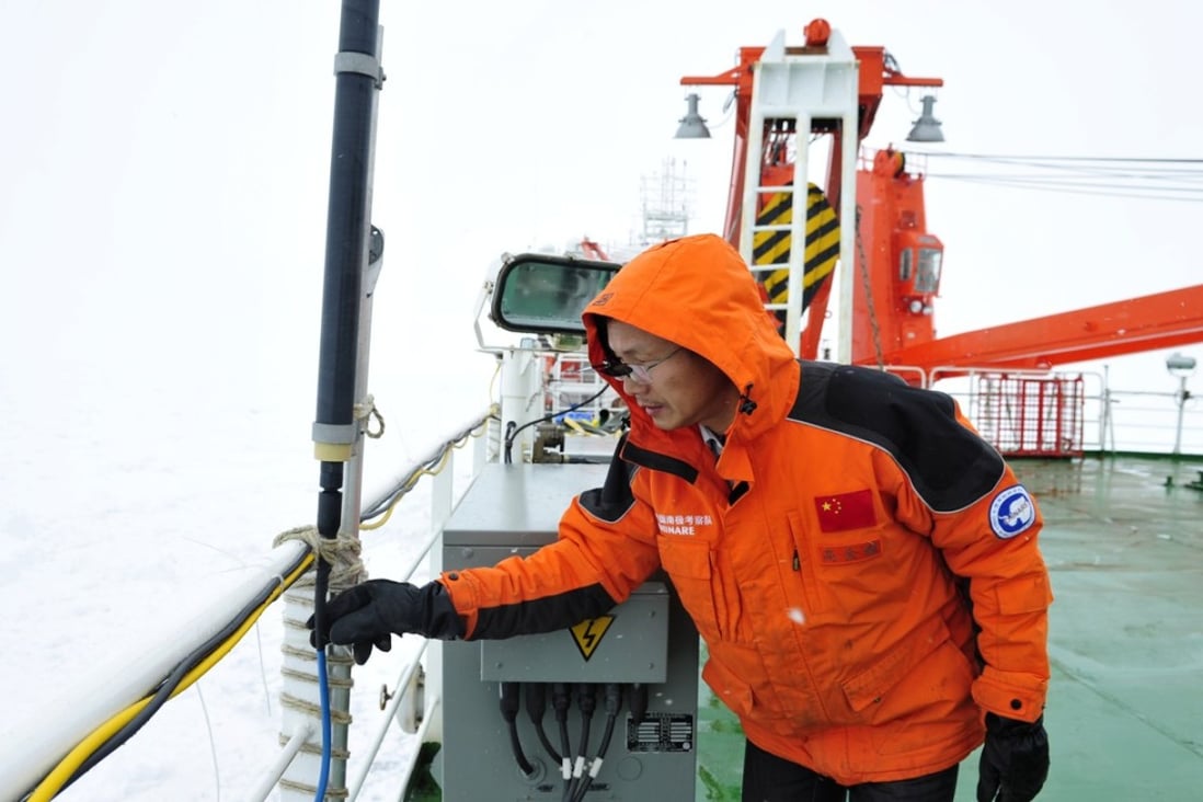 Gao Jinyao, a member of the Chinese Antarctic exploration team, checks a geomagnetometer on the icebreaker Xuelong, or Snow Dragon, in Antarctica, in this file photo from January 5, 2014. Photo: Xinhua