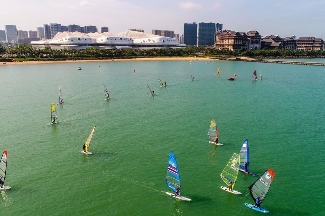 Windsurfing is a popular pastime in the waters off Xixiu Beach in Haikou.