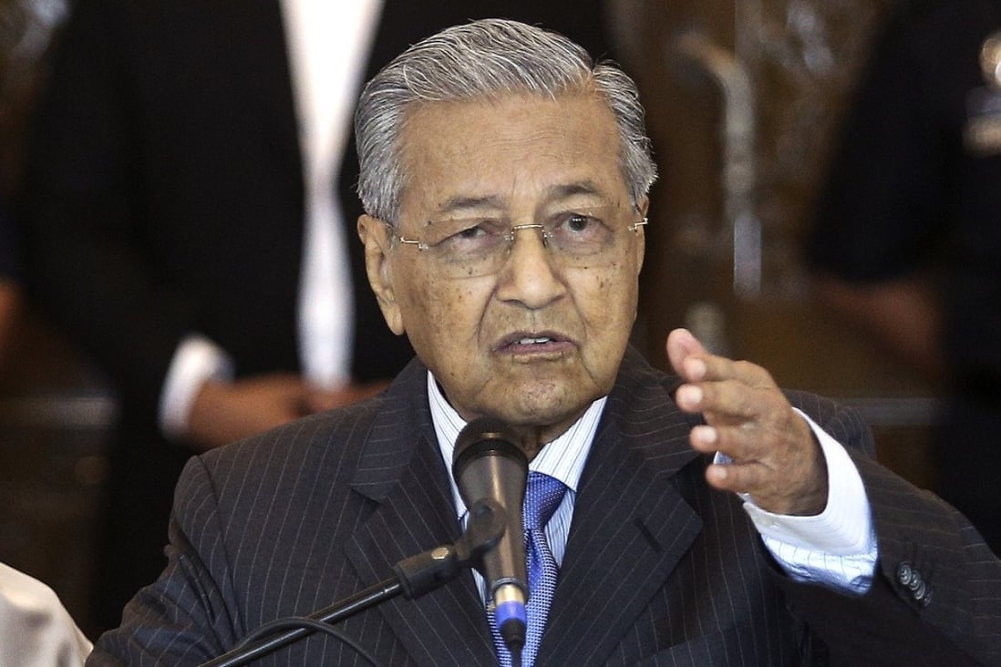 Malaysian Prime Minister Mahathir Mohamad speaks during a press conference after a cabinet meeting in Putrajaya on May 30. Having abused the rule of law and allowed corruption to fester during his 22-year reign that ended in 2003, Mahathir is now being counted on to fix those problems, and others. Photo: AP