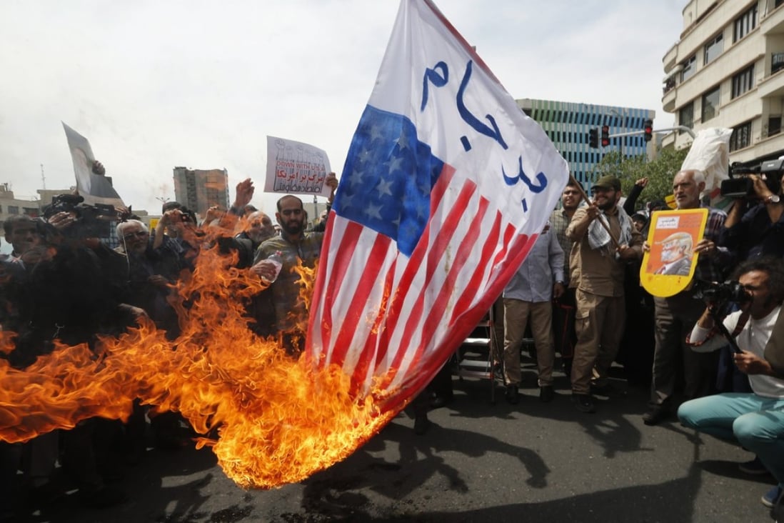 Iranians burn US flags during an anti-US protest after weekly Friday prayer ceremony in Tehran on 11 May 2018. Iranians gathered to protest against the US and President Donald Trump after withdrawing from a 2015 nuclear deal. Trump on 08 May 2018 announced that US will withdraw from the nuclear deal. Foreign ministers from six world powers and Iran finally achieved an agreement to prevent the Islamic republic from developing nuclear weapons, Western diplomats said in Vienna on 14 July 2015. Photo: EPA-EFE/STRINGER