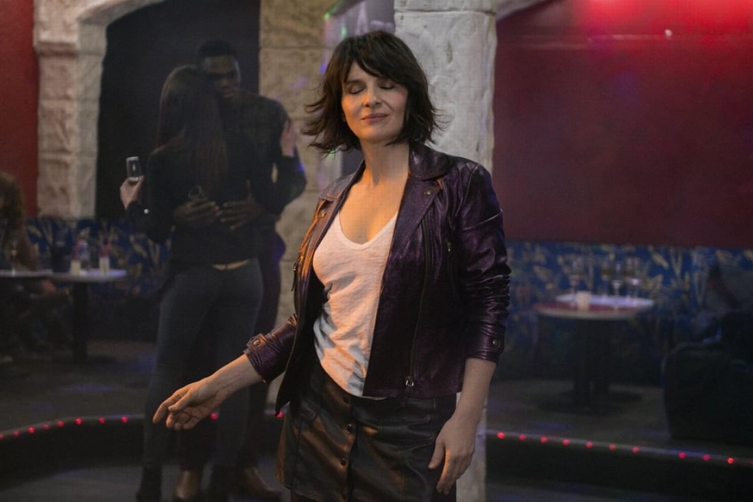 Juliette Binoche in a still from Bright Sunshine In (category IIB, French), directed by Claire Denis and also starring Xavier Beauvois and Gérard Depardieu.