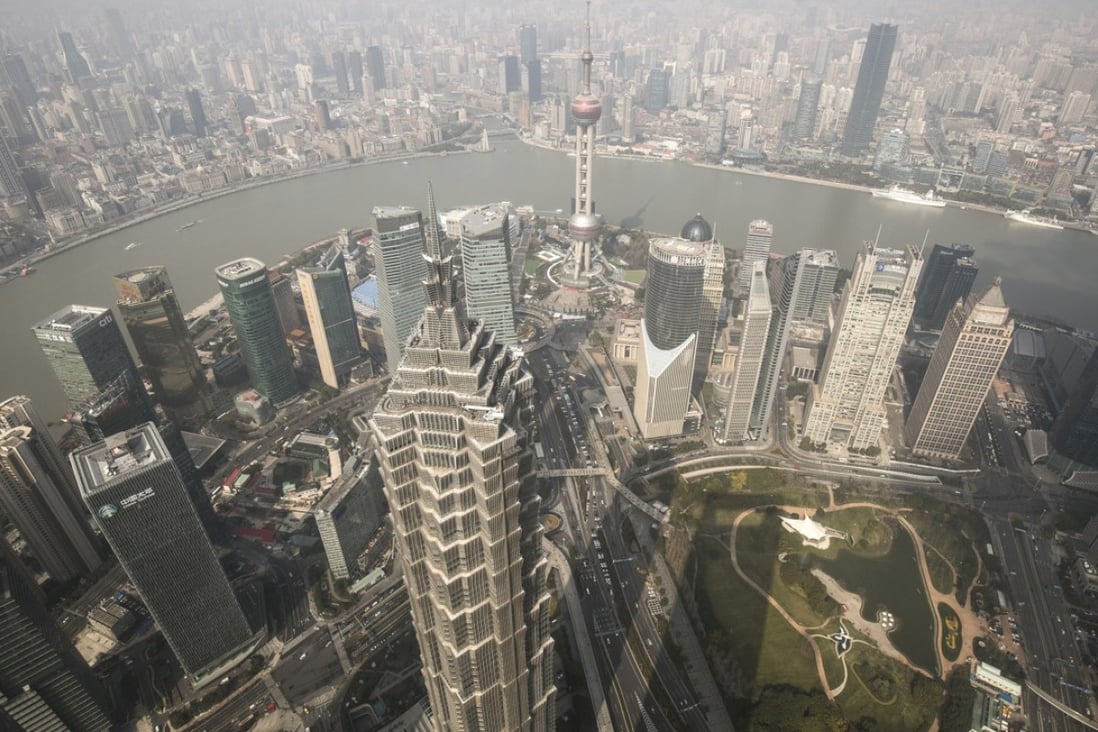 Shanghai’s core Lujiazui financial district with the Jin Mao Tower in the foreground and the Oriental Pearl Tower behind. Photo: Bloomberg