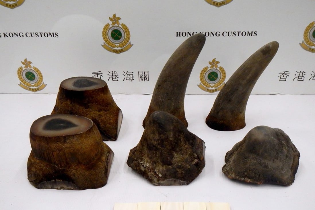 The seized suspected rhino horn and suspected worked ivory at Hong Kong International Airport. Photo: Information Services Department