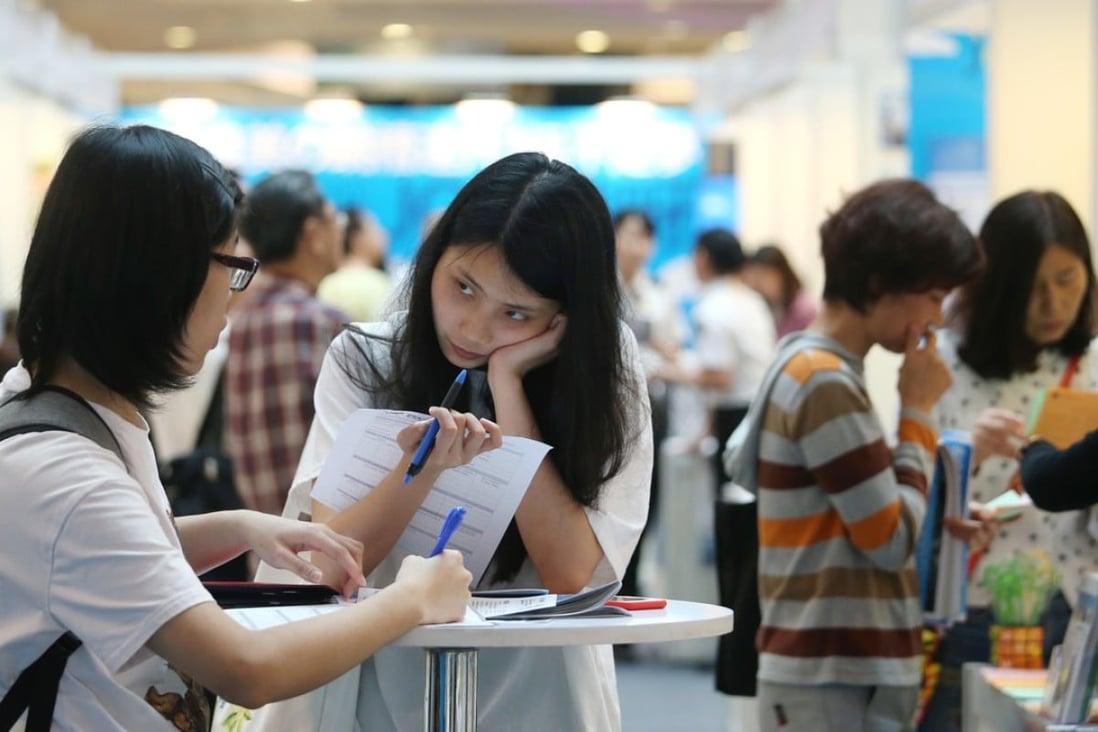 Jobseekers at fair in Hong Kong. About 60 per cent of Hong Kong youth say they cannot find jobs they like. Photo: David Wong