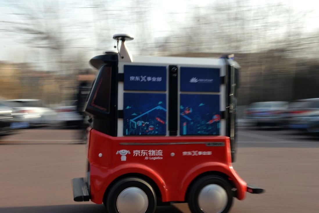 This photo shows a driverless delivery vehicle for Chinese e-commerce company JD.com during a test drive. Photo: AFP