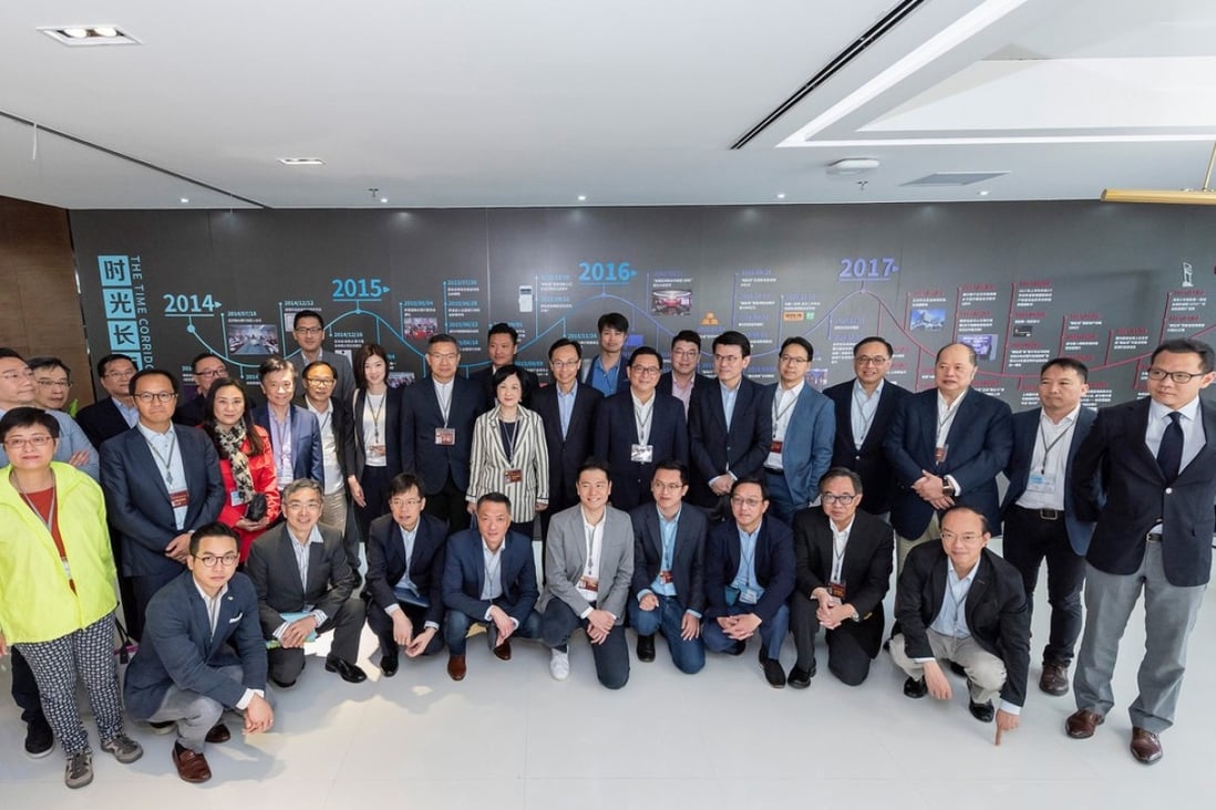 Hong Kong lawmakers from across the political spectrum visit WeBank in Shenzhen, as part of a tour of the Guangdong Bay area in April. Photo: Handout