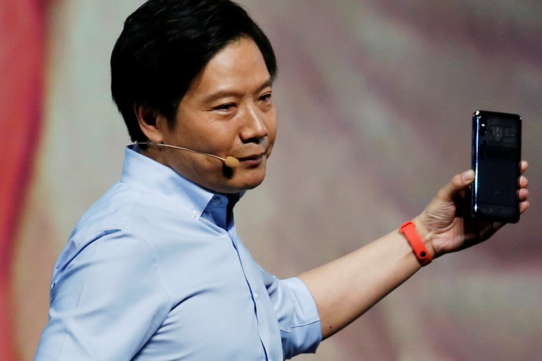 Xiaomi founder Lei Jun introduces the flagship Mi 8 transparent Explorer Edition smartphone during a product launch in Shenzhen on May 31, 2018. Photo: Reuters