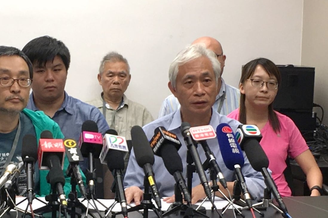 Veteran lawmaker Leung Yiu-chung (right) holds a press conference to address issues of infighting and money problems within his group. Photo: Alvin Lum