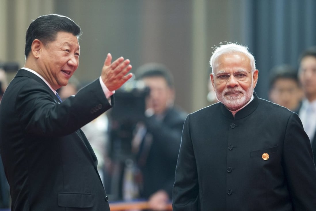 Chinese President Xi Jinping (left) welcomes Indian Prime Minister Narendra Modi for a meeting at the Shanghai Cooperation Organisation summit on Sunday. Photo: AP
