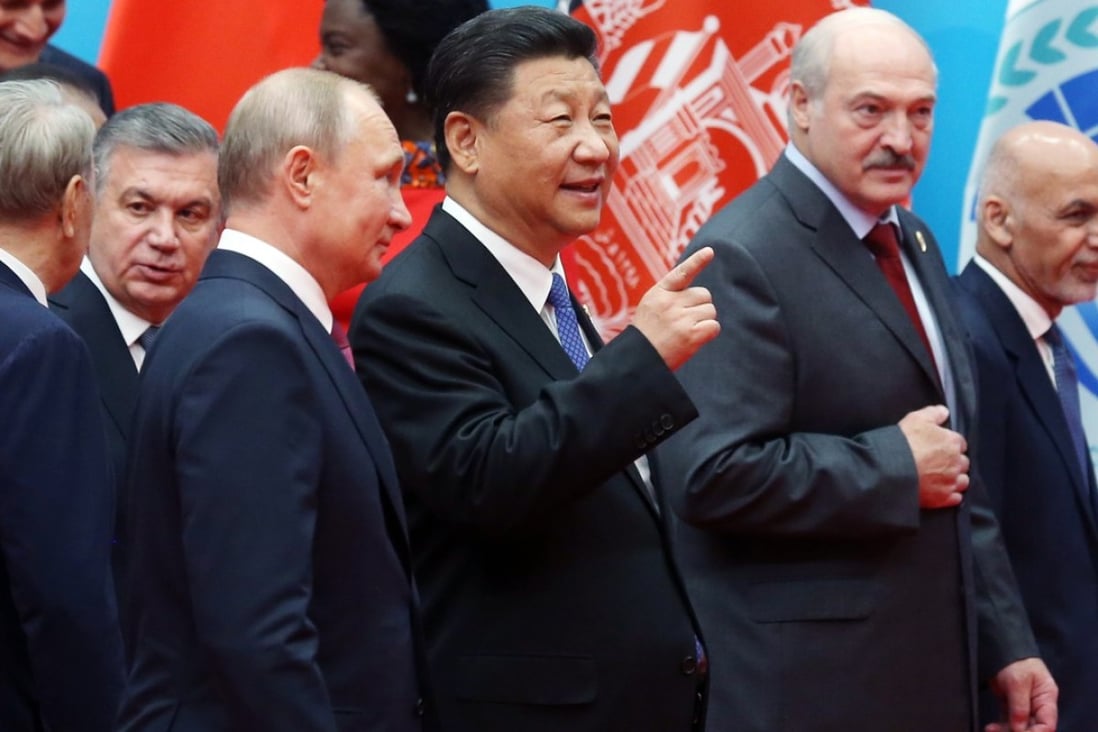 (From left) Vladimir Putin, Xi Jinping, Alexander Lukashenko and Ashraf Ghani take a break at the security summit in Qingdao on Sunday. Photo: EPA-EFE