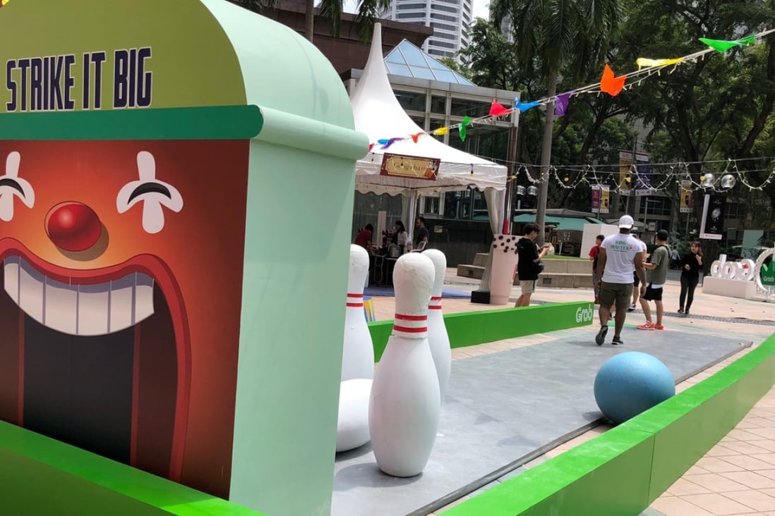 Grab funfair in Singapore to promote its rewards programme.