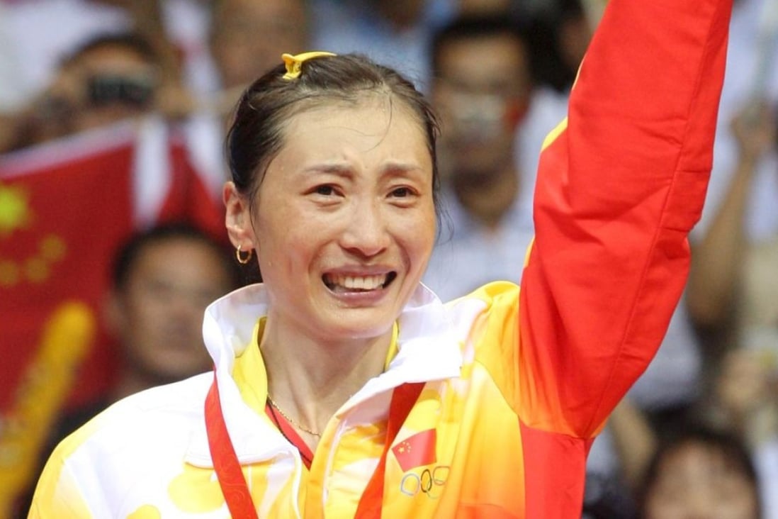 Zhang Ning of China celebrates winning the women’s badminton singles gold medal at the Beijing 2008 Olympics. Photo: EPA
