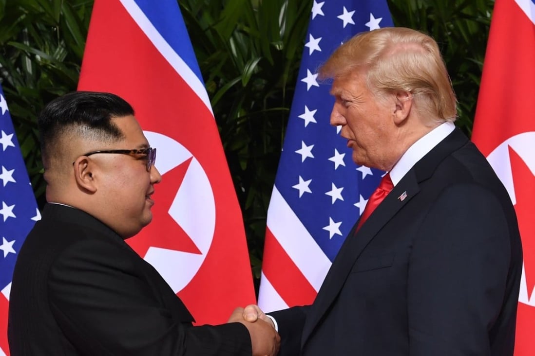 North Korean leader Kim Jong-un with US President Donald Trump at the start of their historic summit, at the Capella Hotel on Sentosa Island, Singapore. Photo: Agence France-Presse